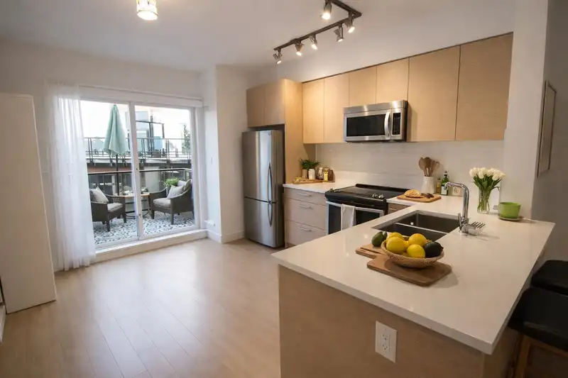 6 909 CLARKE ROAD - photo 3 of 13