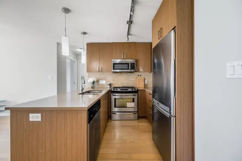702 7117 ELMBRIDGE WAY - photo 2 of 23