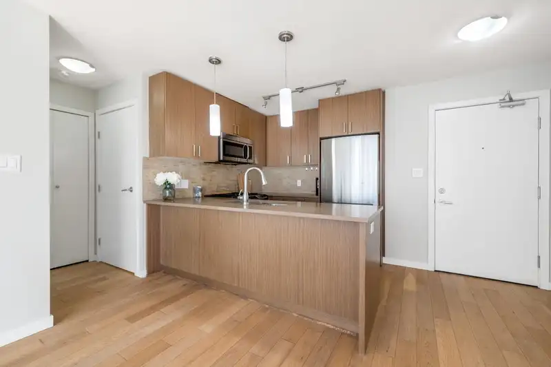 702 7117 ELMBRIDGE WAY - photo 4 of 23