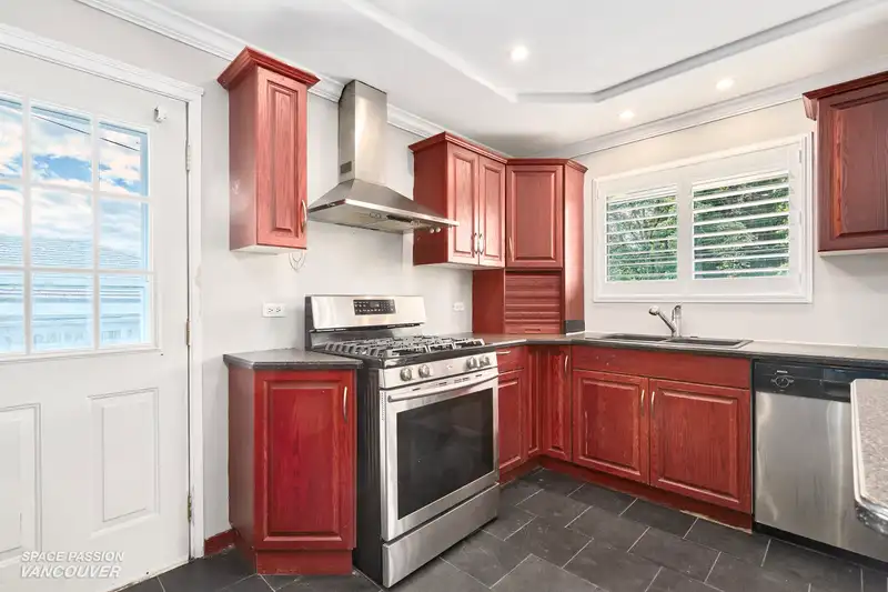 1122 50B STREET - photo 3 of 37