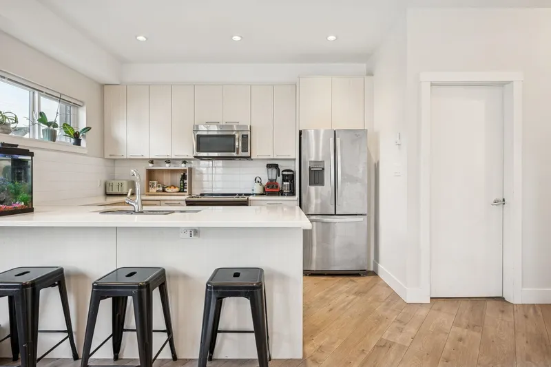 205 7180 BARNET ROAD - photo 1 of 24