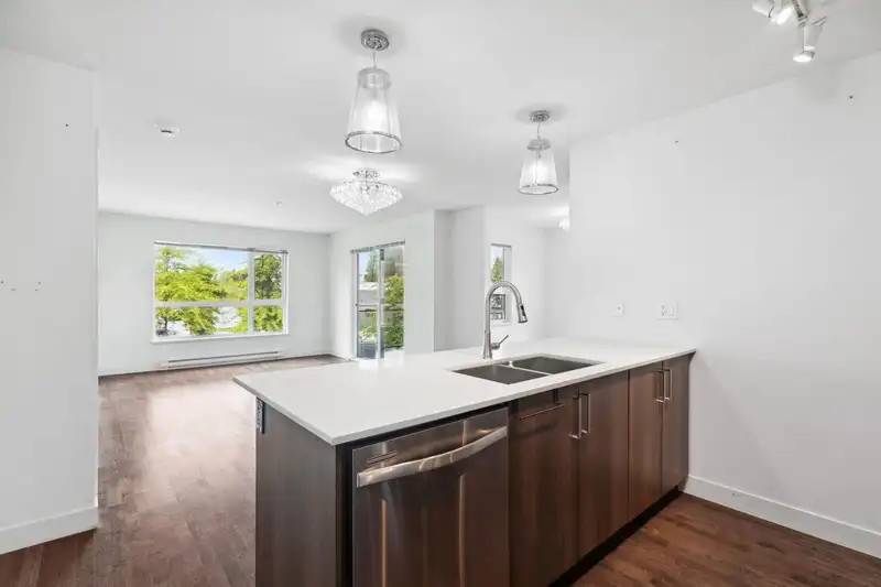 220 7088 14TH AVENUE - photo 3 of 39
