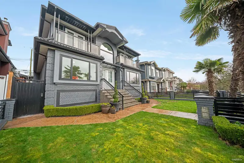 1311 E 63RD AVENUE - photo 3 of 39