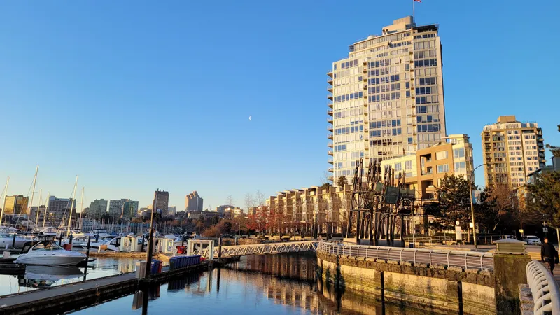 302 1228 MARINASIDE CRESCENT - photo 1 of 25