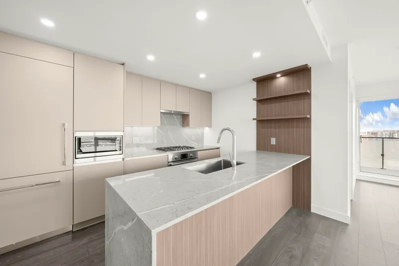 1508 5520 MCNAUGHTON ROAD - photo 1 of 25