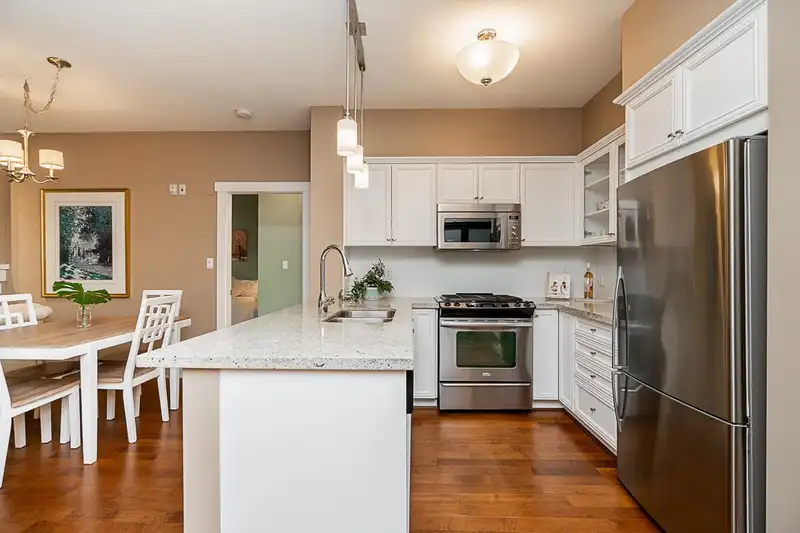 107 1111 E 27TH STREET - photo 3 of 35