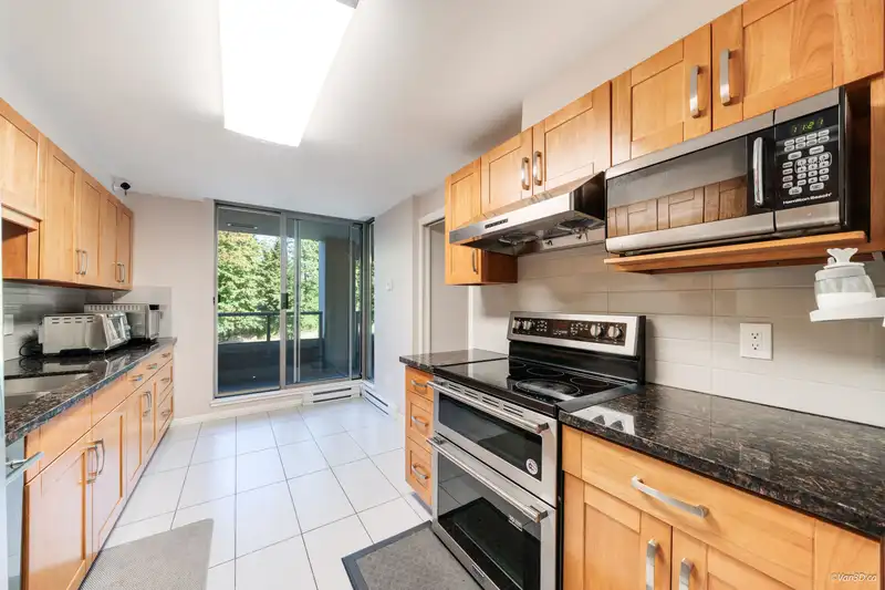 203 3070 GUILDFORD WAY - photo 3 of 29