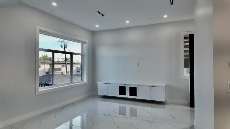 1328 E 64TH AVENUE - photo 3 of 12