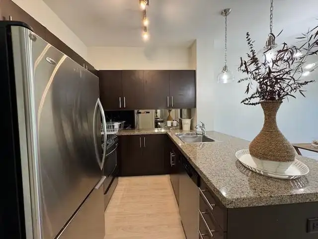 206 8400 ANDERSON ROAD - photo 1 of 14