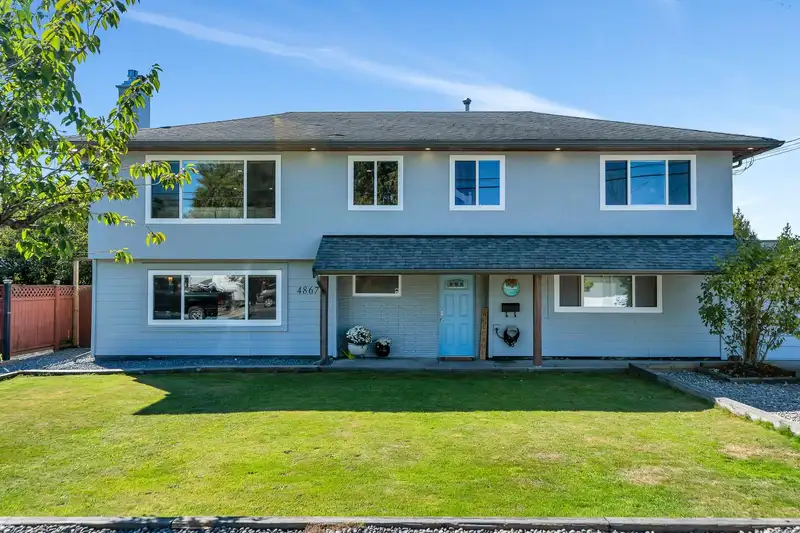 4867 58 STREET - photo 1 of 38