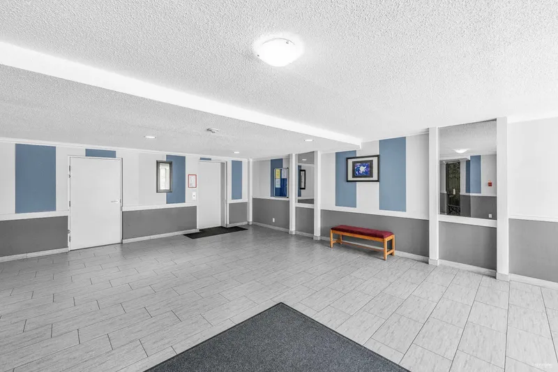 220 8411 ACKROYD ROAD - photo 2 of 24