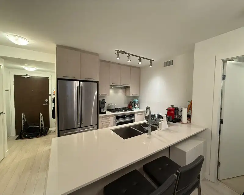 306 7708 ALDERBRIDGE WAY - photo 2 of 39