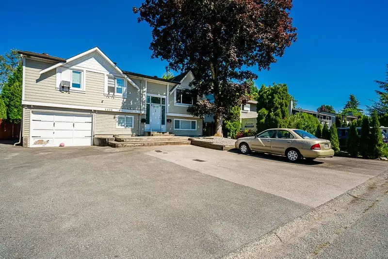 5886 184A STREET - photo 1 of 31
