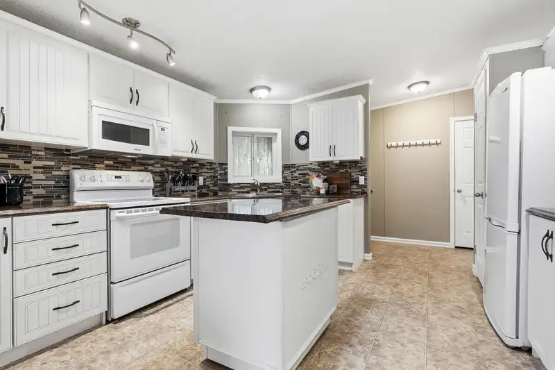 11 44565 MONTE VISTA DRIVE - photo 2 of 26