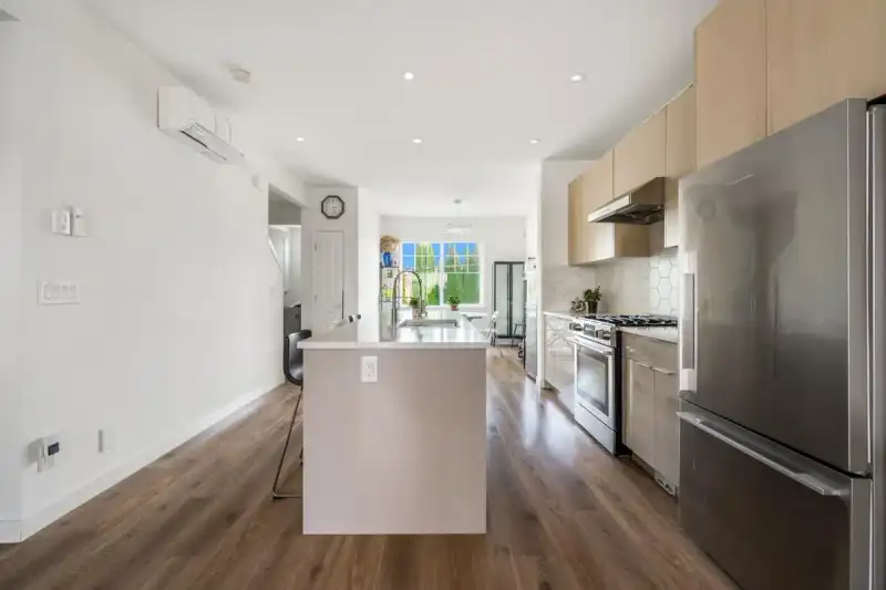 8 7780 BRIDGE STREET - photo 1 of 24