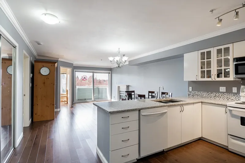 303 12110 80TH AVENUE - photo 4 of 25