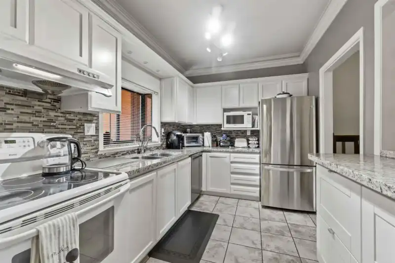 206 7300 GILBERT ROAD - photo 1 of 29