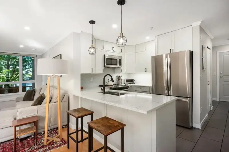 203 3235 W 4TH AVENUE - photo 1 of 14
