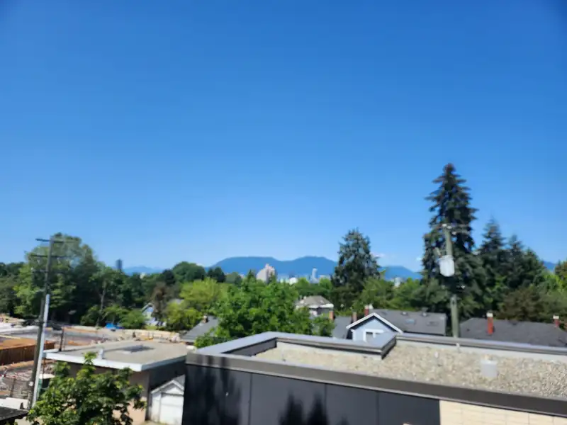 212 523 W KING EDWARD AVENUE - photo 1 of 8