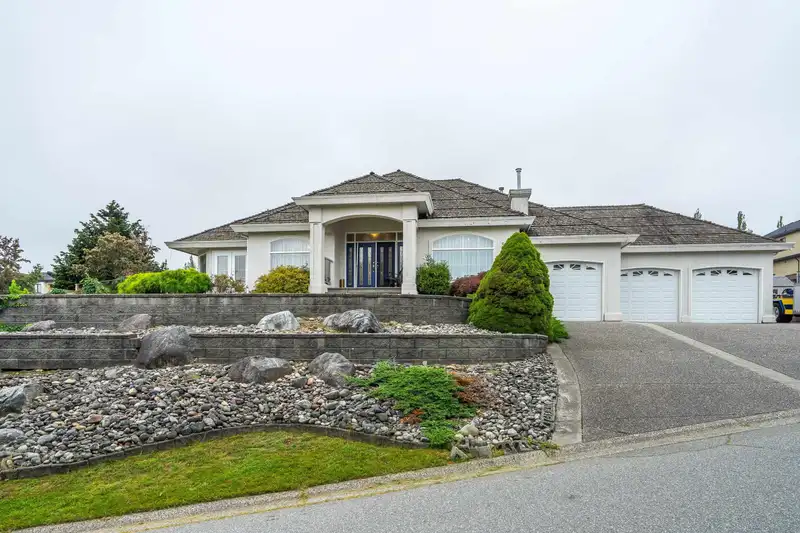 5715 144A STREET - photo 1 of 40