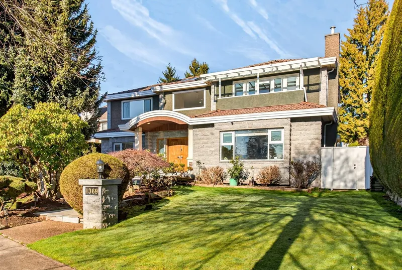 1369 W 55TH AVENUE - photo 1 of 25