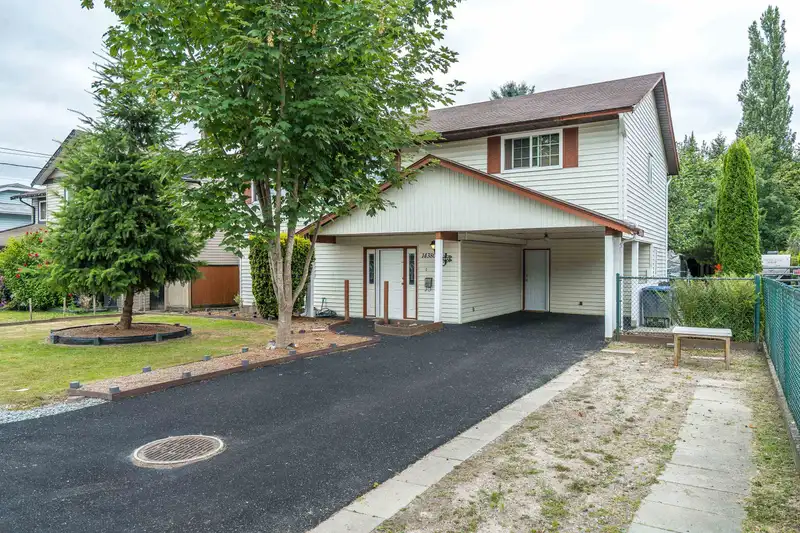 14380 66 AVENUE - photo 1 of 21