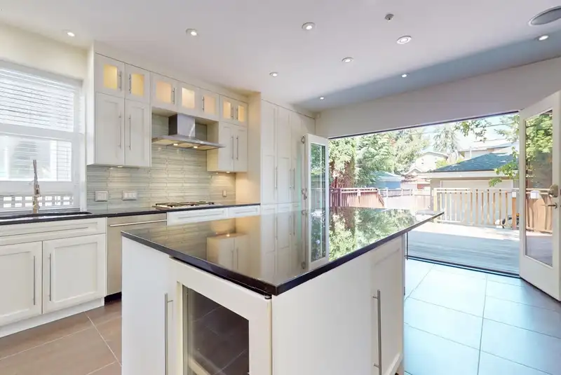4447 W 15TH AVENUE - photo 4 of 26