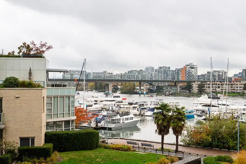 309 1288 MARINASIDE CRESCENT - photo 1 of 39