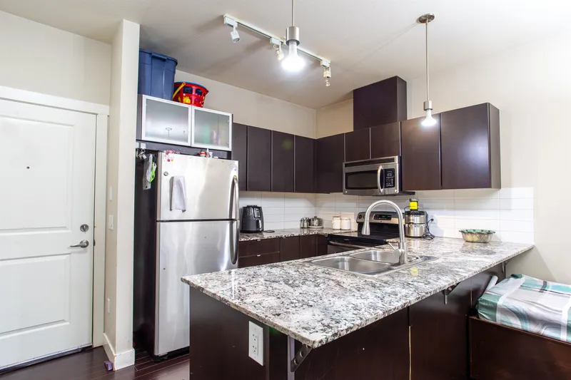 409 9655 KING GEORGE BOULEVARD - photo 1 of 16