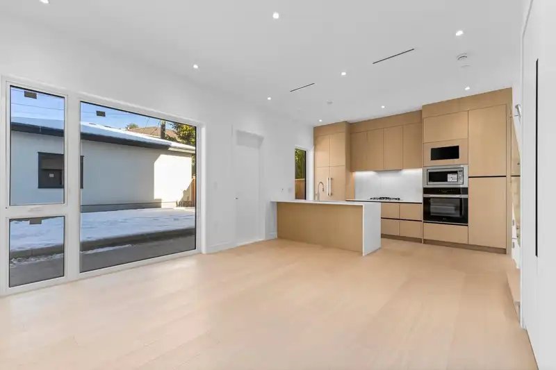 2 1315 W 64TH AVENUE - photo 4 of 23