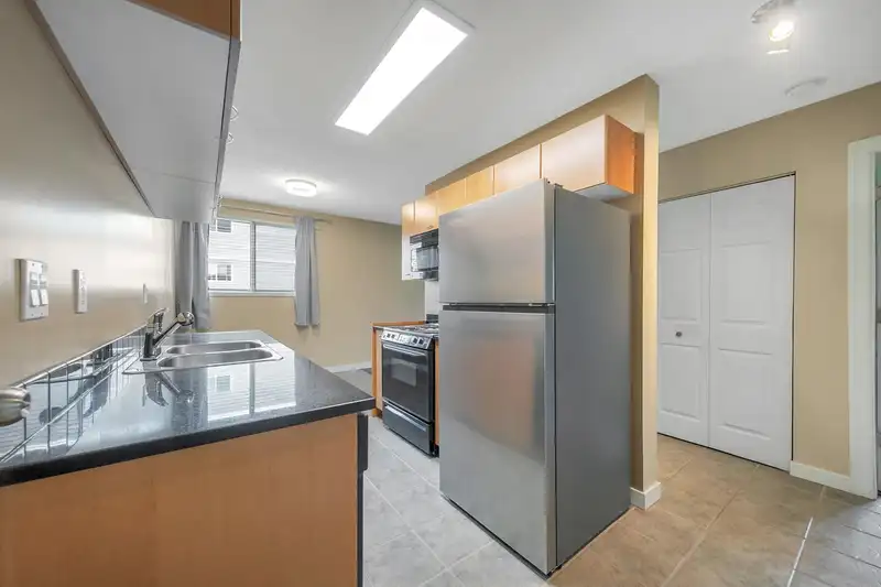 303 1121 HOWIE AVENUE - photo 1 of 24