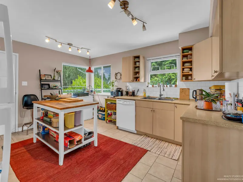 4865 11A AVENUE - photo 3 of 25