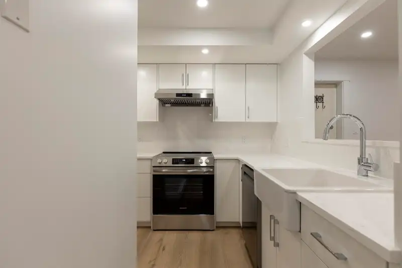 102 3787 PENDER STREET - photo 1 of 36