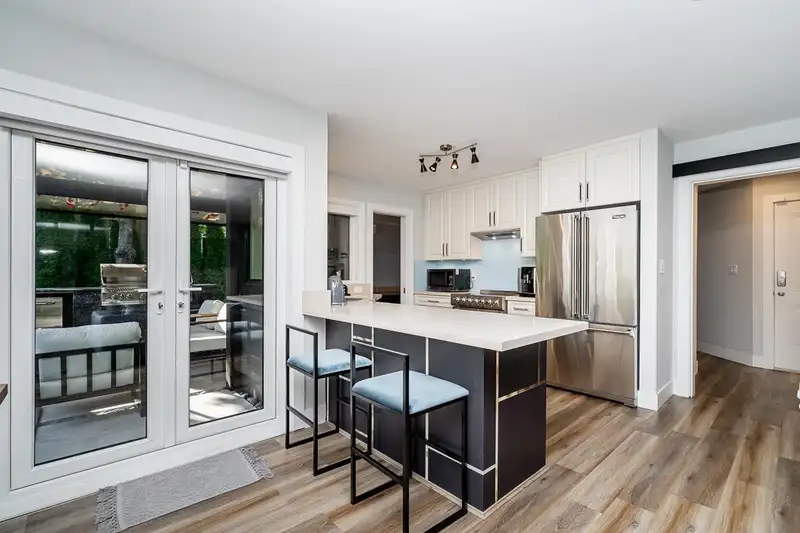 3688 W 49TH AVENUE - photo 4 of 37