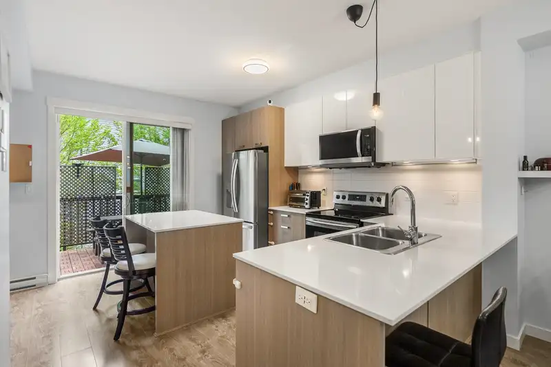 19 6450 187 STREET - photo 1 of 36