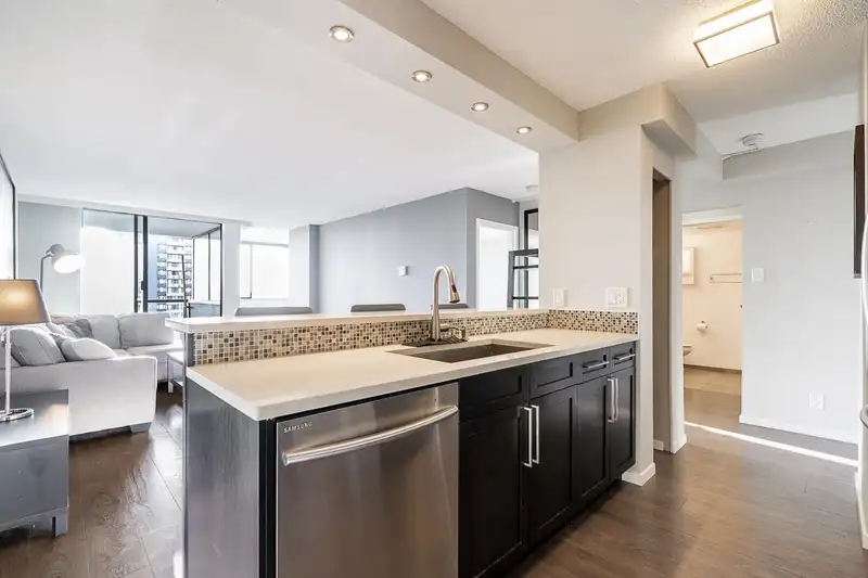 2101 9521 CARDSTON COURT - photo 3 of 40
