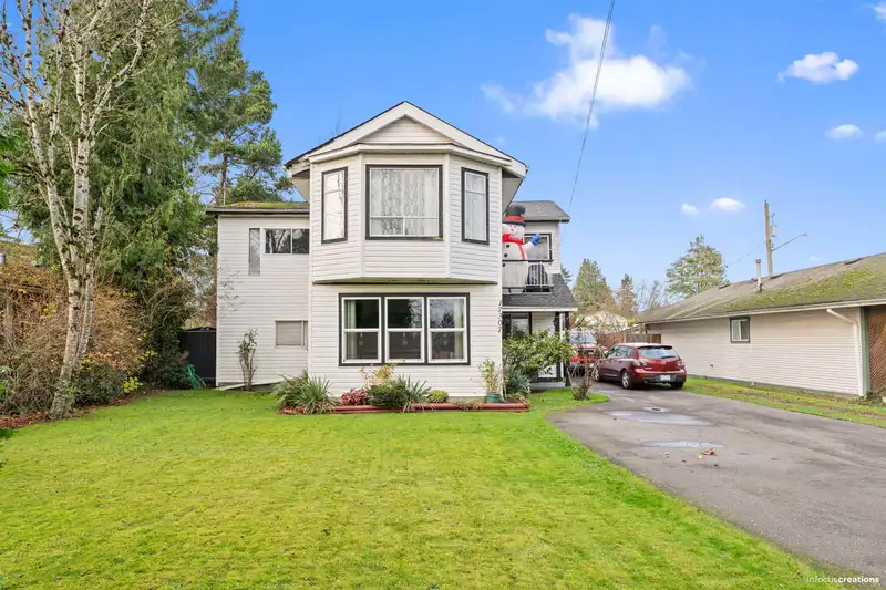 17307 58 AVENUE - photo 1 of 21