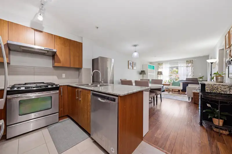 109 5889 IRMIN STREET - photo 1 of 21