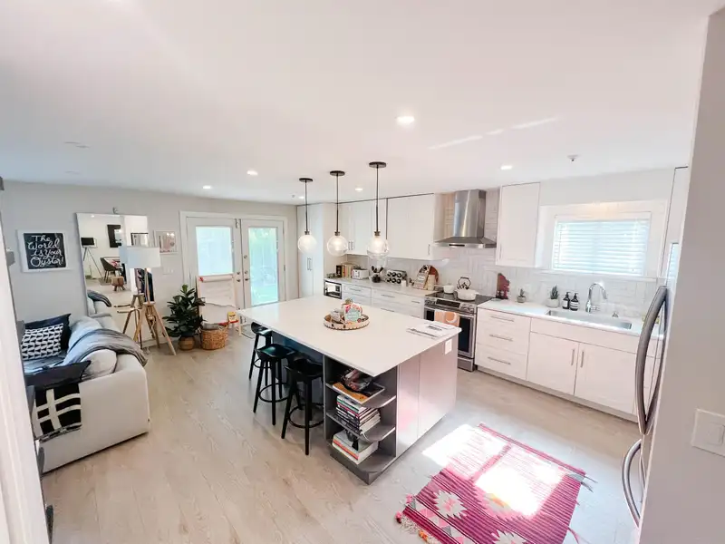 1229 E 11TH AVENUE - photo 1 of 17