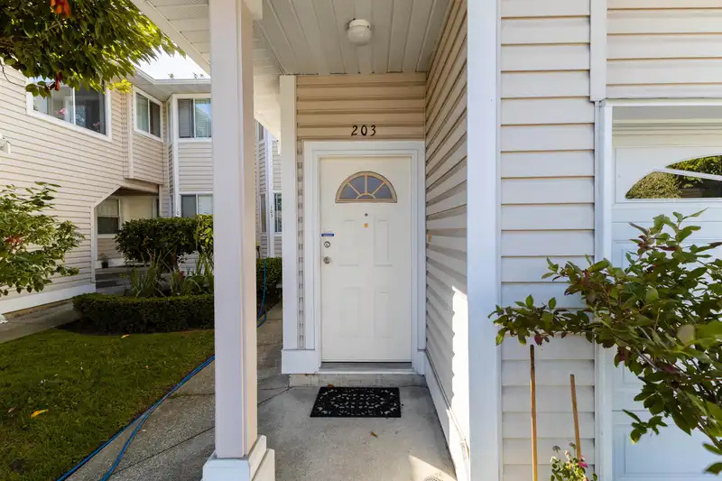 203 9310 KING GEORGE BOULEVARD - photo 1 of 26