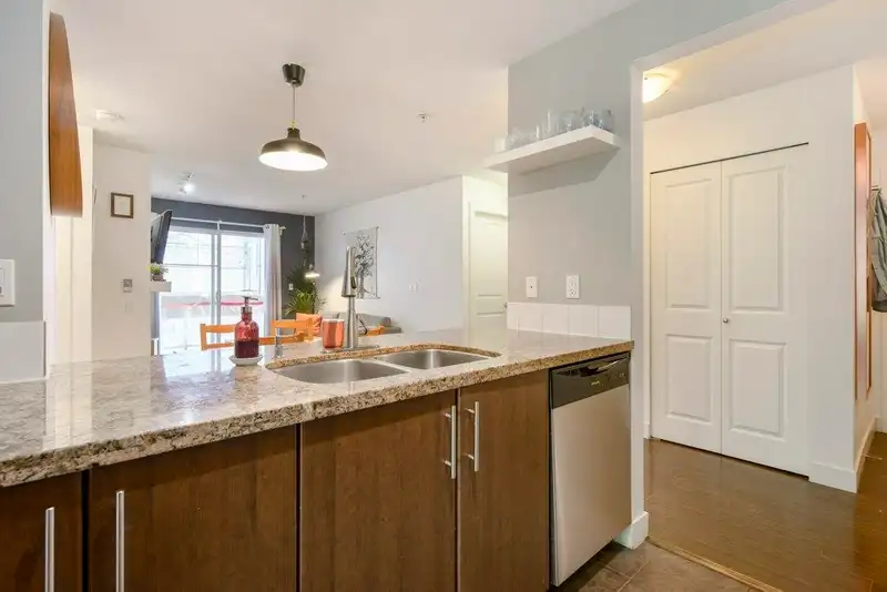 207 3240 ST JOHNS STREET - photo 1 of 25