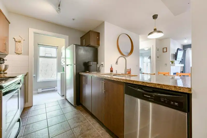 207 3240 ST JOHNS STREET - photo 2 of 25