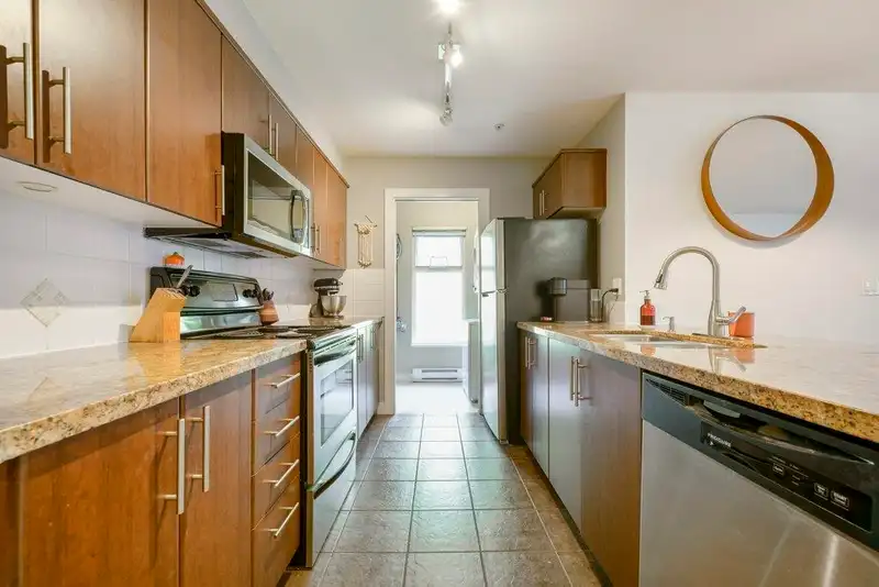 207 3240 ST JOHNS STREET - photo 3 of 25