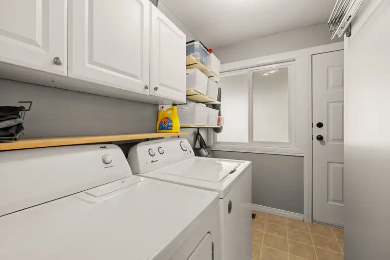 7691 WOODCOCK CRESCENT - photo 4 of 40