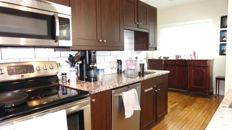 1 12016 YORK STREET - photo 3 of 26