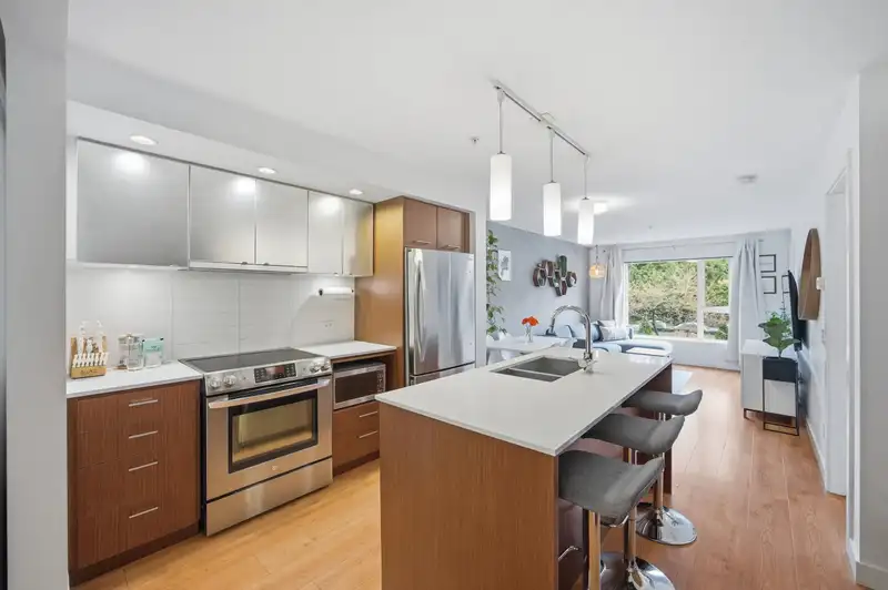 209 221 E 3RD STREET - photo 3 of 27
