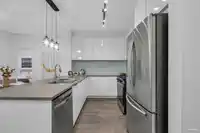 411 1152 WINDSOR MEWS - thumbnail 4