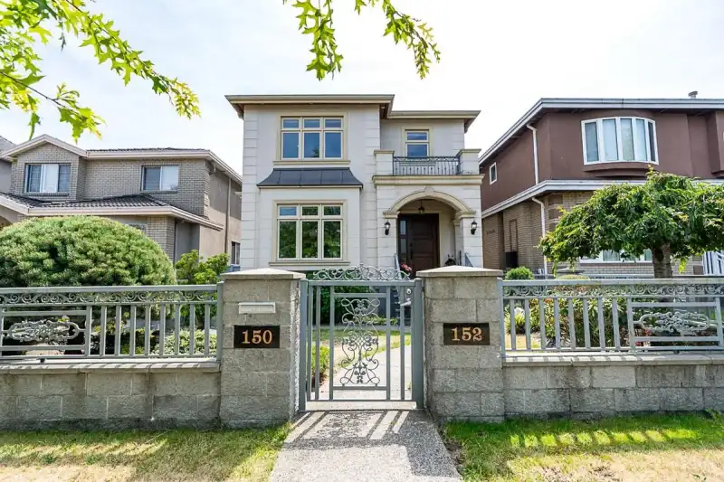 152 W 48TH AVENUE - photo 1 of 39
