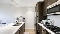 703 3333 SEXSMITH ROAD - thumbnail 7