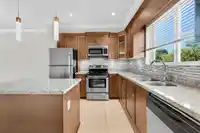 203A 7159 STRIDE AVENUE - thumbnail 2
